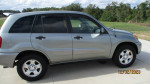 2004 Toyota RAV4 with 104,000 miles, garage kept, featuring new battery and tires, economical and dependable.