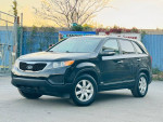 2013 Kia Sorento LX FWD in black with alloy wheels parked outside, showcasing excellent condition and clean title.