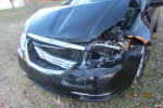 2014 Chrysler 200 Touring FWD with front damage, ideal for repair or parts, located outdoors.