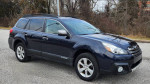 2014 Subaru Outback 2.5i AWD SUV in Deep Indigo Pearl with leather interior and advanced features.