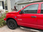 2008 Dodge RAM 1500 Big Horn edition in red with upgraded features and slight cosmetic wear