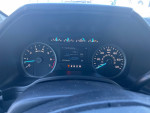 Dashboard of a 2018 Ford F-150 XLT showing fuel economy and mileage details.
