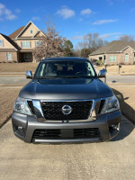 Front view of a 2019 Nissan Armada SL with leather seats, navigation, and new tires for sale.