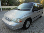 2002 Ford Windstar LX van with wheelchair lift, low mileage, clean and ready for sale.
