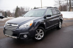 2013 Subaru Outback, well maintained with all-wheel drive, recent brake and tire replacements, highway driven.