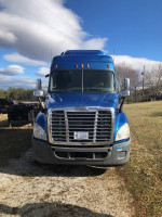 2013 Freightliner Cascadia with 1,000,133 miles, fresh A/C, and well-maintained exterior, parked outdoors.