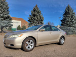 2008 Toyota Camry LE in excellent condition, front view showing clean exterior and new tires.