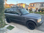 2006 Land Rover Range Rover in great condition with black wheels parked on the street