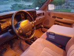 Interior view of a 1995 Dodge 3500 dually truck with a classic dashboard and comfortable seating.