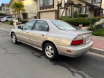 1997 Honda Accord Special Edition parked on the street, showcasing its sleek design and excellent condition.