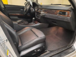 Interior of a well-maintained 2006 BMW 330i with leather seats and luxurious finish