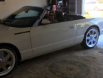 2003 Thunderbird hardtop convertible parked in a garage, ready for the Christmas season.