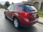 2010 Chevrolet Equinox LT in maroon color parked on the street with alloy wheels and clean exterior.