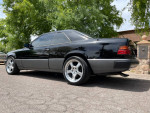 1990 Mercedes-Benz 300CE E-Class Coupe in black, showcasing timeless elegance and low mileage.