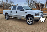2000 Ford F250 Super Duty 4x4 truck with 267,000 miles, clean title, upgraded features, and stylish alloy wheels