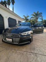 2015 Audi A5 for sale, grey exterior, sleek black interior, automatic transmission, low mileage of 47,000 miles.
