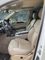 Interior of a 2015 Mercedes ML350 with leather seats and a panoramic moon roof.