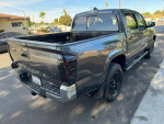 2021 Toyota Tacoma SR5 4WD pickup truck with clean interior and new tires, ready for adventure.