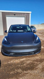 2023 Long Range Tesla Model Y in excellent condition with upgraded black wheels and heated leather seats