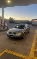 2002 Volkswagen Passat GLX 4Motion AWD parked at gas station, low mileage and in excellent condition.