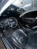 Interior of 2002 Volkswagen Passat GLX 4Motion with black leather seats and dashboard features