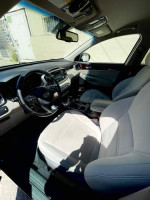 Interior view of a 2016 Kia Sorento L showing spacious seating and modern dashboard features