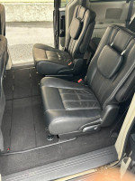 Interior view of 2016 Dodge Grand Caravan showing leather-faced seating and spacious layout