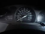 Speedometer showing 223226 miles on a 1997 Toyota Tercel interior dashboard