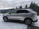 2017 Ford Edge SEL FWD for sale, silver SUV with AWD, parked in snowy landscape