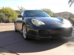 2004 Porsche 911 Carrera 4S in Atlas Grey Metallic with sport wheels parked outdoors