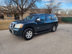 2007 Nissan Armada in great condition with V8 engine and leather interior parked outdoors