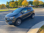 2017 Buick Encore Premium FWD in excellent condition with low mileage parked on a residential street