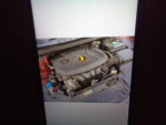 Engine view of a 2013 Hyundai Elantra Limited highlighting its new motor and battery.