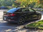 2021 Polestar 2 AWD Long Range in black with sporty design parked in a scenic area