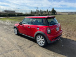 2010 Mini Cooper S in red, well maintained with a clean title and panoramic sunroof