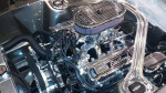 Detailed view of a polished engine in a 2008 Ford Mustang project car, showcasing high-performance components.