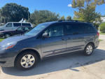 2009 Toyota Sienna LE 7-passenger minivan in good condition with new wheel bearing and alternator.
