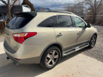 2007 Hyundai Veracruz SUV in metallic gold, showing its clean exterior and sporty design.