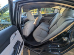 Interior view of a 2014 Honda Civic LX with spacious seating and clean upholstery.