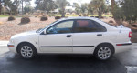 2001 Volvo S40 luxury sedan in polar white with leather interior, parked outdoors