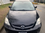 Front view of a 2007 Mazda 5 wagon, black color, showcasing clean design and well-maintained condition.