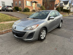 2011 Mazda 3 in silver, automatic, 83,000 miles, clean title, reliable with new brakes and tires