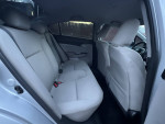 Interior view of a 2014 Honda Civic, showcasing spacious back seats and comfortable design.