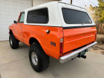 1971 Chevrolet K5 Blazer 4X4 in orange with a removable hardtop and off-road tires