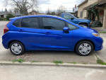 2018 Honda Fit in blue color parked on the street with clean title and low mileage available for sale.