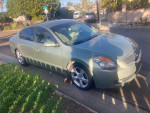 2007 Nissan Altima 3.5se parked on street, well-maintained with new tires and brakes.