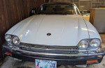 1989 Jaguar XJS project car in white, stored in carport, needs repairs and not driveable.