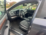 Interior view of a 2017 Subaru Outback 2.5i AWD showing premium features and clean condition.