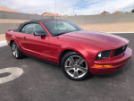 2008 Ford Mustang convertible in red, with 92,000 miles, in excellent condition and well-maintained.
