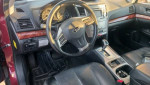Interior view of a 2012 Subaru Outback with leather seats and modern dashboard features